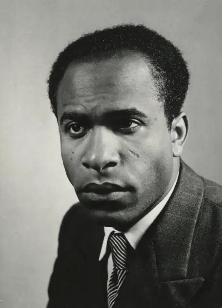 Black-and-white portrait photograph of Frantz Fanon.